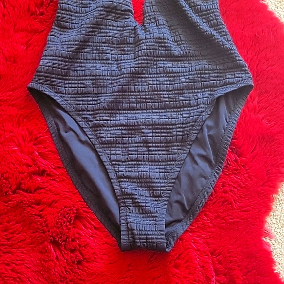 BECCA black swimsuit textured w/gold bull ring at chest plunge front hi legs NWT - Picture 5 of 9